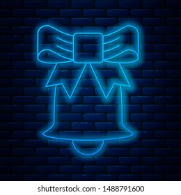 Glowing neon line Ringing bell icon isolated on brick wall background. Alarm symbol, service bell, handbell sign, notification symbol.  Vector Illustration