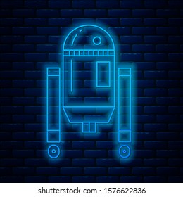 Glowing neon line Robot icon isolated on brick wall background.  Vector Illustration