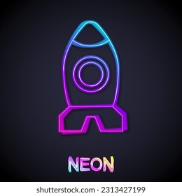 Glowing neon line Rocket ship toy icon isolated on black background. Space travel.  Vector
