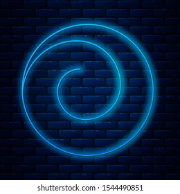 Glowing neon line Roll bun with cinnamon icon isolated on brick wall background. Bakery products.  Vector Illustration