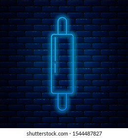Glowing neon line Rolling pin icon isolated on brick wall background.  Vector Illustration