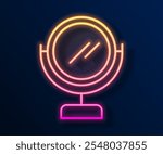 Glowing neon line Round makeup mirror icon isolated on black background.  Vector