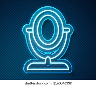 Glühende Neonline Runde Schminkspiegel Symbol einzeln auf blauem Hintergrund.  Vektorgrafik