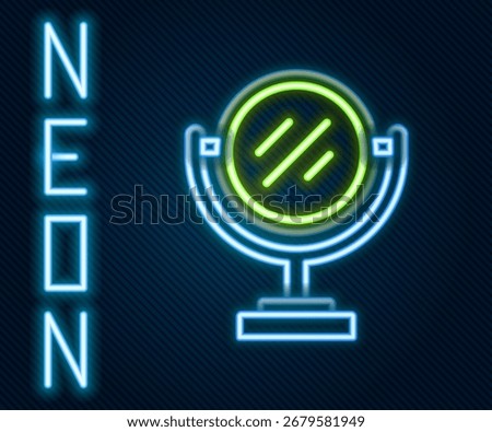 Glowing neon line Round makeup mirror icon isolated on black background. Colorful outline concept. Vector