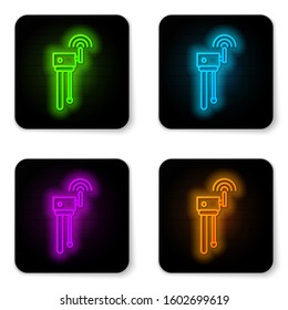 Glowing neon line Router and wi-fi signal symbol icon isolated on white background. Wireless ethernet modem router. Computer technology internet. Black square button. Vector Illustration