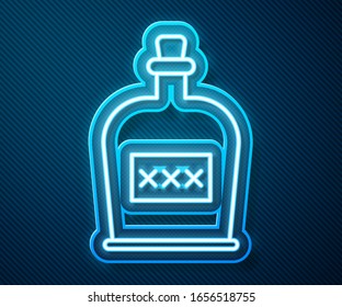 Glowing neon line Rum bottle icon isolated on blue background.  Vector Illustration