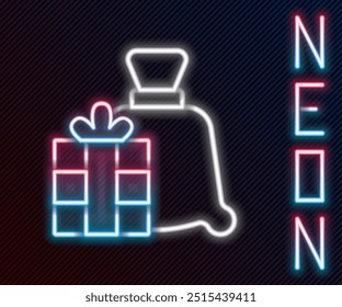 Glowing neon line Santa Claus bag gift icon isolated on black background. Christmas presents sack. Merry Christmas and Happy New Year. Colorful outline concept. Vector