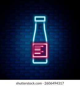 Glowing neon line Sauce bottle icon isolated on brick wall background. Ketchup, mustard and mayonnaise bottles with sauce for fast food. Colorful outline concept. Vector