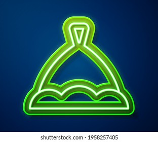Glowing neon line Sauna hat icon isolated on blue background.  Vector