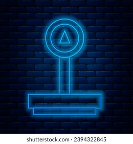 Glowing neon line Scale icon isolated on brick wall background. Logistic and delivery. Weight of delivery package on a scale.  Vector