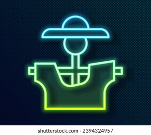 Glowing neon line Scarecrow icon isolated on black background.  Vector