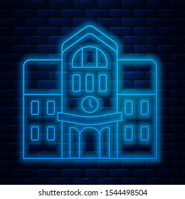 Glowing neon line School building icon isolated on brick wall background.  Vector Illustration