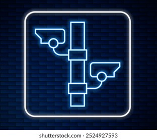 Glowing neon line Security camera icon isolated on brick wall background.  Vector