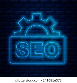 Glowing neon line SEO optimization icon isolated on brick wall background.  Vector