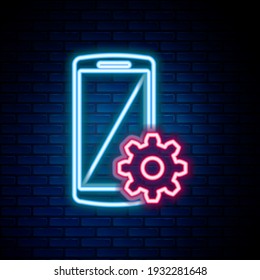 Glowing neon line Setting on smartphone icon isolated on brick wall background. Mobile and gear. Adjusting, service, setting, maintenance, repair, fixing. Colorful outline concept. Vector