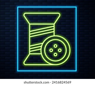 Glowing neon line Sewing thread on spool and button icon isolated on brick wall background. Yarn spool. Thread bobbin.  Vector Illustration