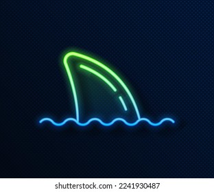 Glowing neon line Shark fin in ocean wave icon isolated on blue background.  Vector