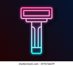 Glowing neon line Shaving razor icon isolated on black background.  Vector