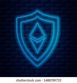 Glowing neon line Shield Ethereum ETH icon isolated on brick wall background. Cryptocurrency mining, blockchain technology, security, protect, digital money.  Vector Illustration