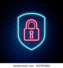 Glowing neon line Shield security with lock icon isolated on brick wall background. Protection, safety, password security. Firewall access privacy sign. Colorful outline concept. Vector