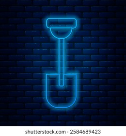 Glowing neon line Shovel icon isolated on brick wall background. Gardening tool. Tool for horticulture, agriculture, farming.  Vector