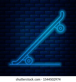 Glowing neon line Skateboard icon isolated on brick wall background. Extreme sport. Sport equipment.  Vector Illustration