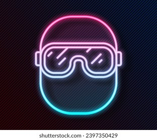 Glowing neon line Ski goggles icon isolated on black background. Extreme sport. Sport equipment.  Vector