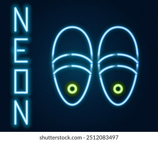 Glowing neon line Slippers icon isolated on black background. Flip flops sign. Colorful outline concept. Vector