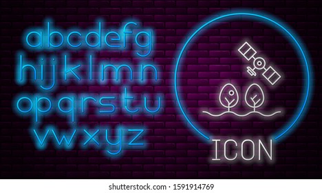 Glowing neon line Smart farm with drone control and tree icon isolated on brick wall background. Innovation technology for agricultural company. Neon light alphabet. Vector Illustration