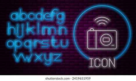 Glowing neon line Smart photo camera system icon isolated on brick wall background. Internet of things concept with wireless connection. Neon light alphabet. Vector