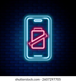 Glowing neon line Smartphone battery charge icon isolated on brick wall background. Phone with a low battery charge. Colorful outline concept. Vector