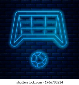 Glowing neon line Soccer goal with ball icon isolated on brick wall background.  Vector
