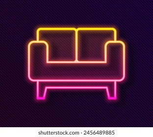 Glowing neon line Sofa icon isolated on black background.  Vector