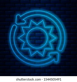 Glowing neon line Solar energy panel icon isolated on brick wall background. Sun with lightning symbol.  Vector Illustration