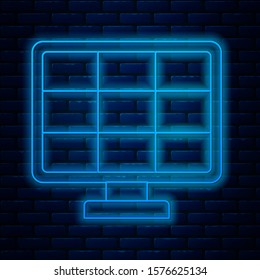 Glowing neon line Solar energy panel icon isolated on brick wall background.  Vector Illustration