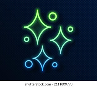 Glowing neon line Sparkle stars with magical glitter particles icon isolated on blue background. Magic christmas decoration.  Vector Illustration