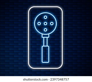 Glowing neon line Spatula icon isolated on brick wall background. Kitchen spatula icon. BBQ spatula sign. Barbecue and grill tool.  Vector