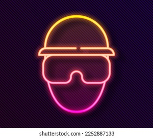 Glowing neon line Special forces soldier icon isolated on black background. Army and police symbol of defense.  Vector