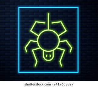 Glowing neon line Spider icon isolated on brick wall background. Happy Halloween party.  Vector