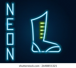 Glowing neon line Sport boxing shoes icon isolated on black background. Wrestling shoes. Colorful outline concept. Vector
