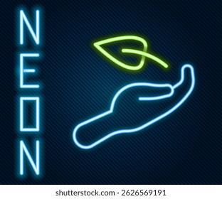 Glowing neon line Sprout in hand of environmental protection icon isolated on black background. Seed and seedling. Planting sapling. Ecology concept. Colorful outline concept. Vector