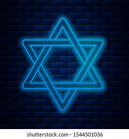 Glowing neon line Star of David icon isolated on brick wall background. Jewish religion symbol. Symbol of Israel.  Vector Illustration