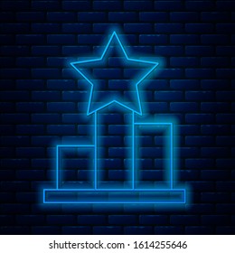 Glowing neon line Star icon isolated on brick wall background. Favorite, score, best rating, award symbol.  Vector Illustration