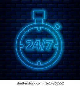 Glowing neon line Stopwatch 24 hours icon isolated on brick wall background. All day cyclic icon. 24 hours service symbol.  Vector Illustration