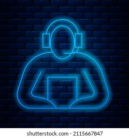 Glowing neon line Student icon isolated on brick wall background.  Vector Illustration