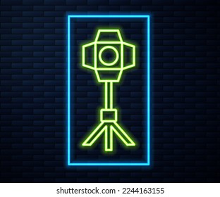 Glowing neon line Studio light bulb in softbox icon isolated on brick wall background. Shadow reflection design.  Vector
