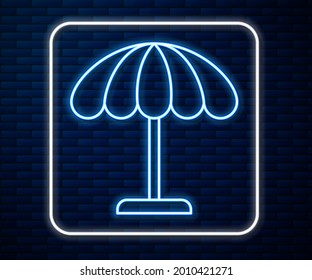 Glowing neon line Sun protective umbrella for beach icon isolated on brick wall background. Large parasol for outdoor space. Beach umbrella.  Vector Illustration