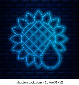 Glowing neon line Sunflower icon isolated on brick wall background.  Vector Illustration