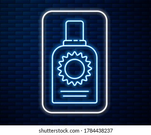 Glühende Neonline Sonnenschutzflasche Symbol einzeln auf Ziegelmauerhintergrund. Schutz der Haut vor UV-Sonnenlicht.  Vektorgrafik