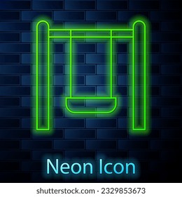 Glowing neon line Swing for kids summer games on playground icon isolated on brick wall background. Outdoor entertainment equipment.  Vector